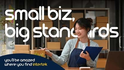 Woman holding a folder with stacks of packages behind her