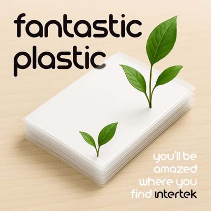 A stack of plastic sheets with green plants emerging from the top